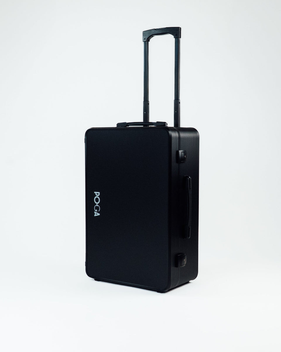 Black suitcase with handle on a white background